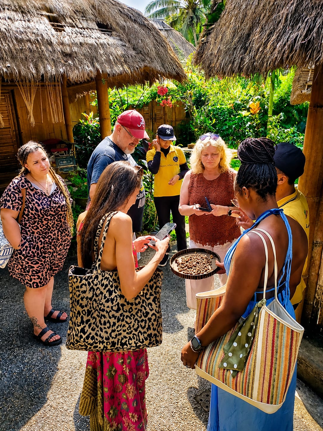 Guests learning about locally grown coffee during a Bali cultural experience
