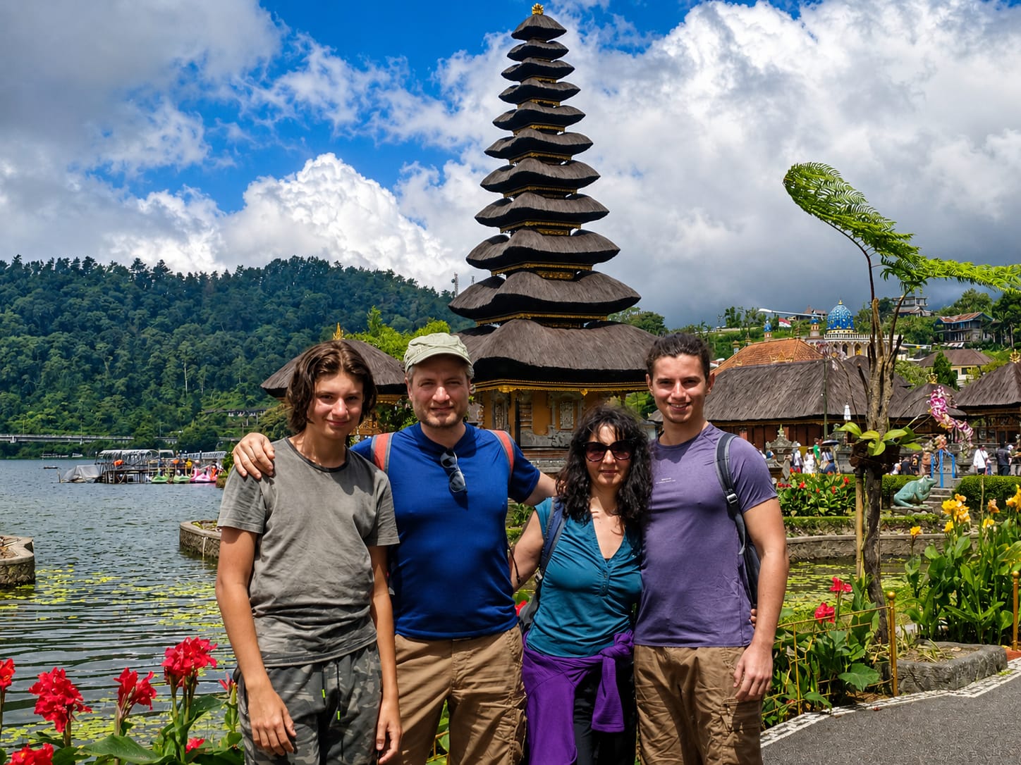 A family visiting Ulun Danu Beratan Temple during their Bali journey